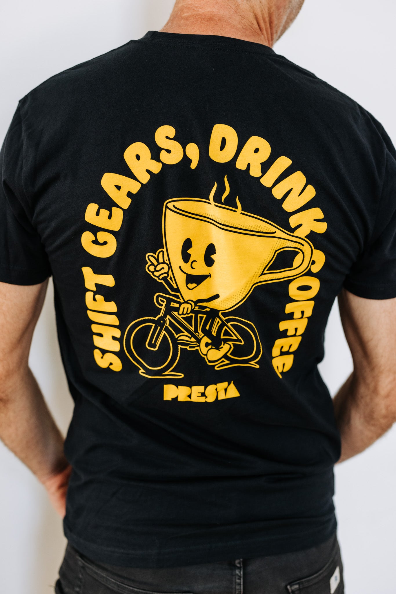 T-Shirt, "Shift Gears, Drink Coffee" Black W/ Yellow Print